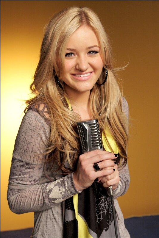Woman Holding Microphone — Yellow