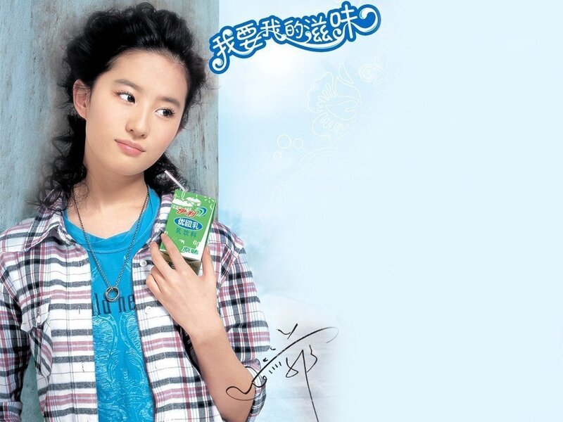 woman holding milk carton