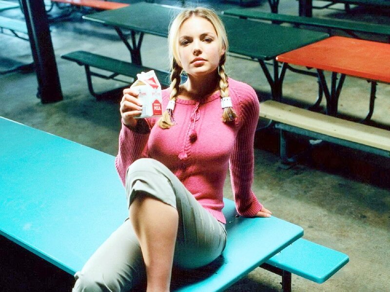 Woman holding milk carton