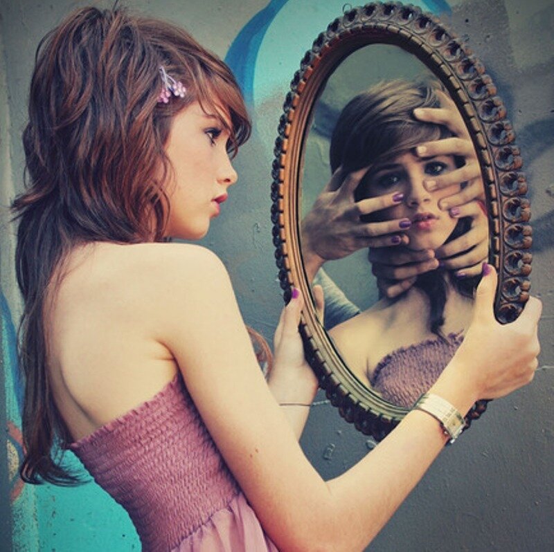 Woman Holding Mirror — Brown