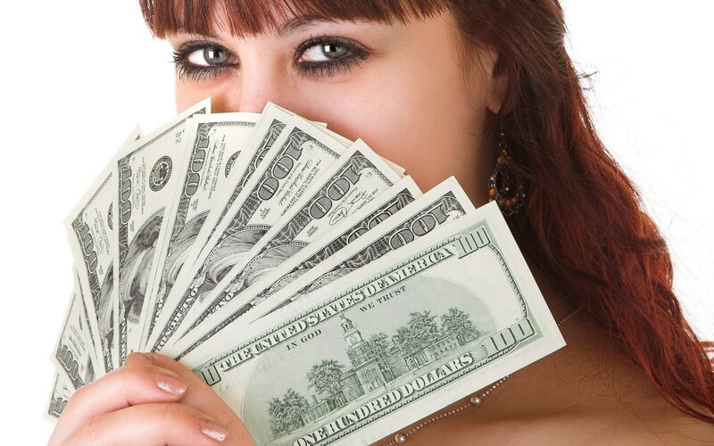 woman holding money