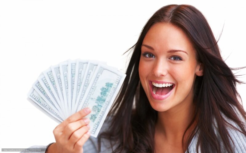 woman holding money
