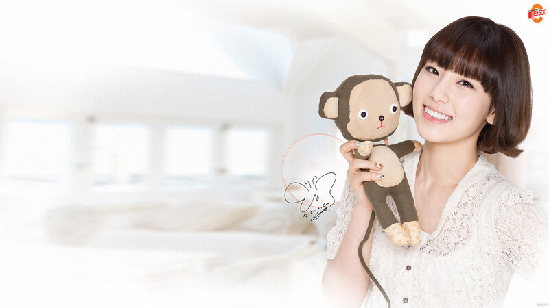 woman holding monkey plush