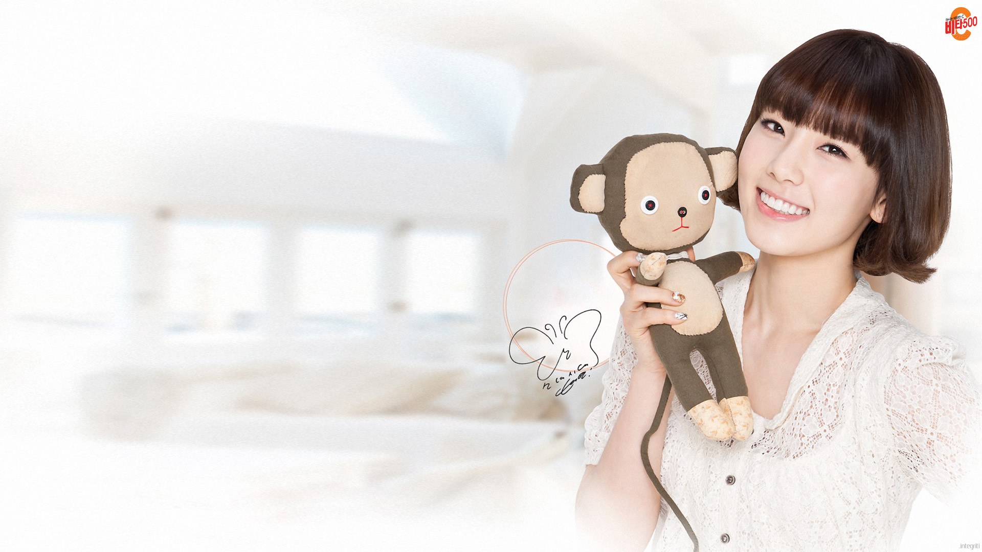 woman holding monkey plush
