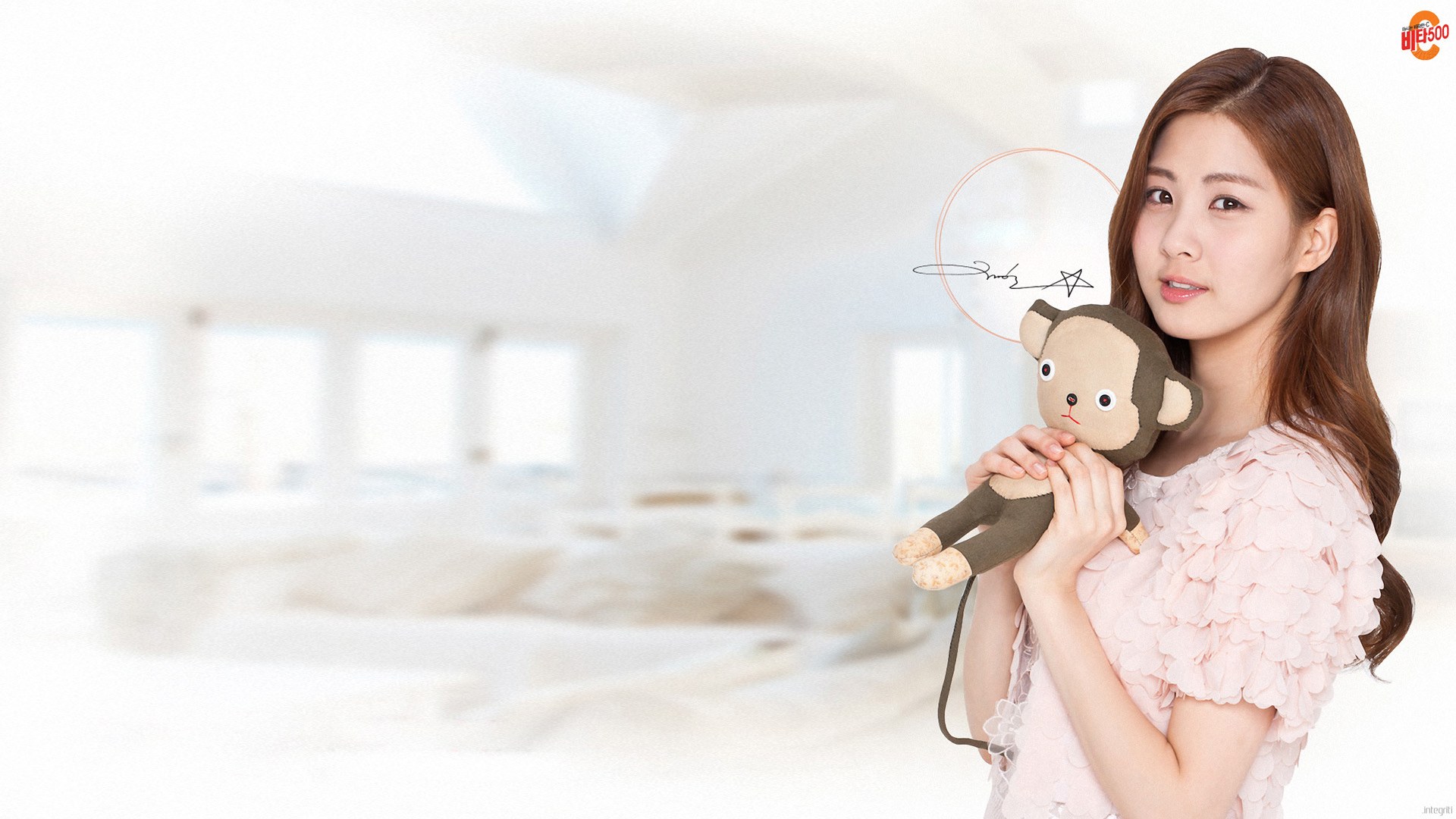 woman holding monkey plush