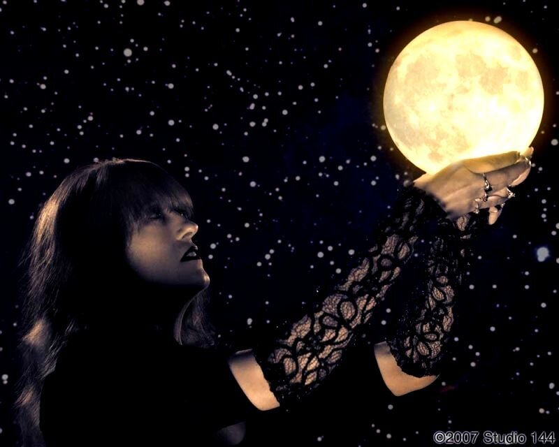 Woman Holding Moon