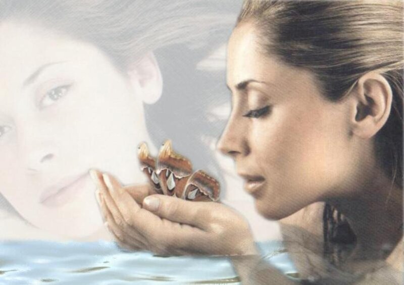 Woman Holding Moth