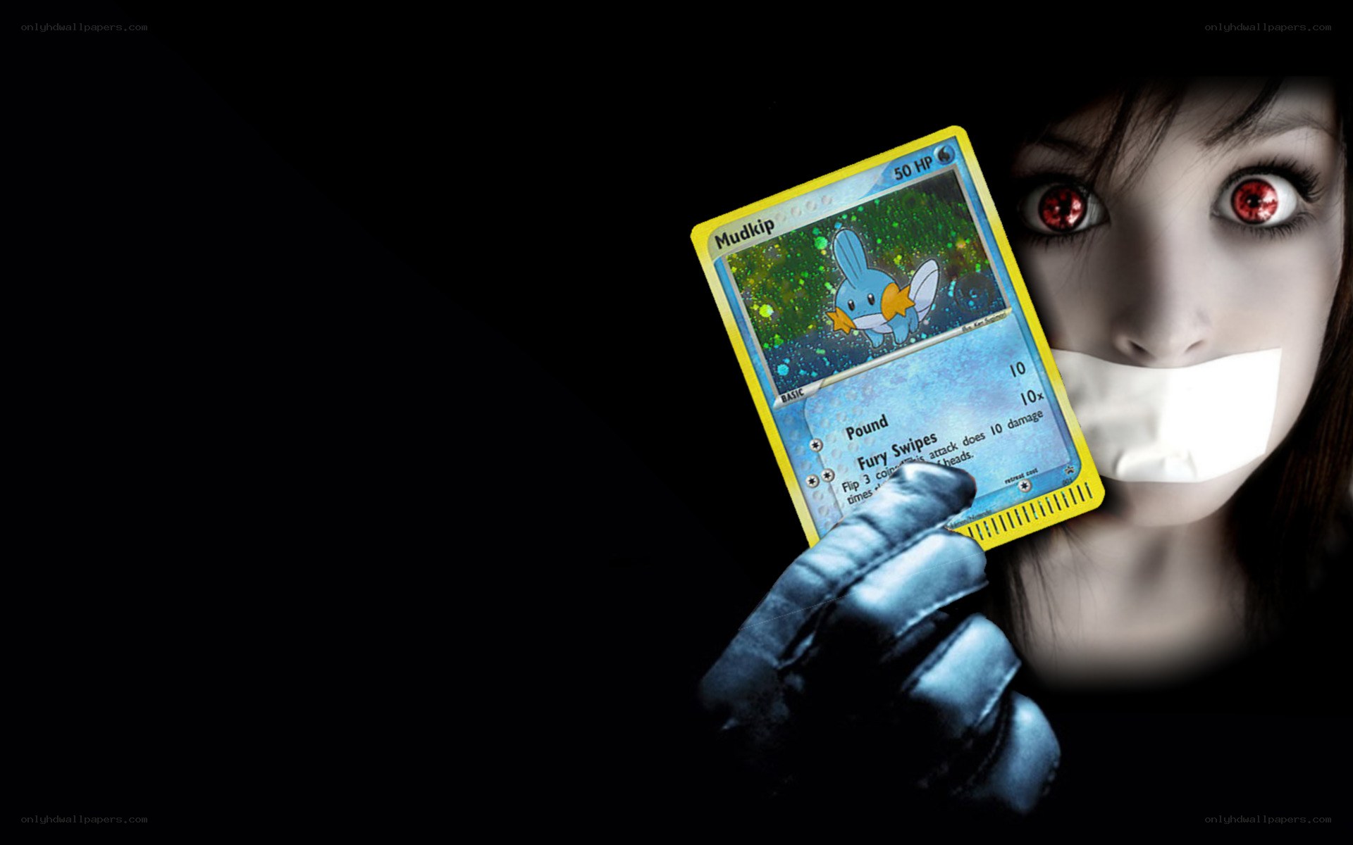 woman holding mudkip card