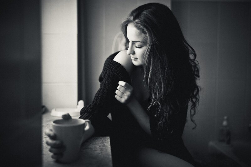 Woman Holding Mug — Black, Contemplative