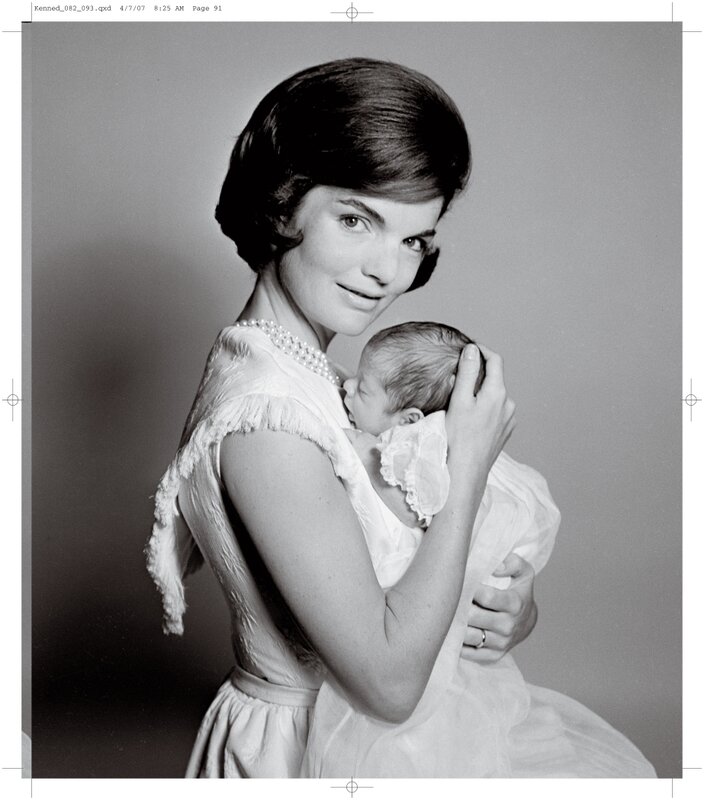 Woman holding newborn baby
