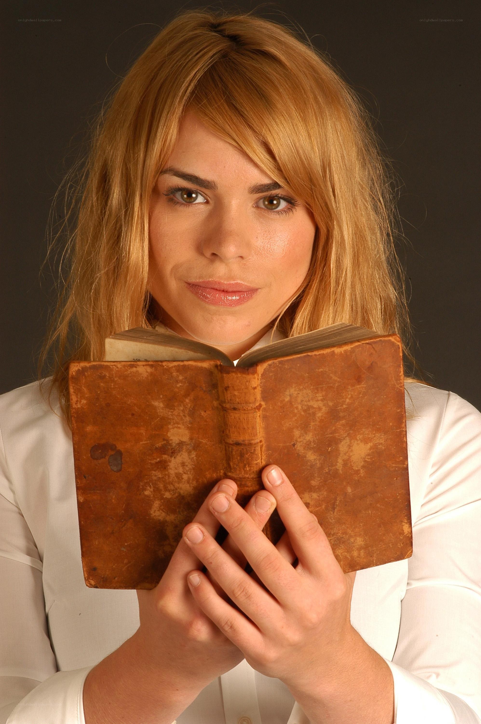 woman holding old book