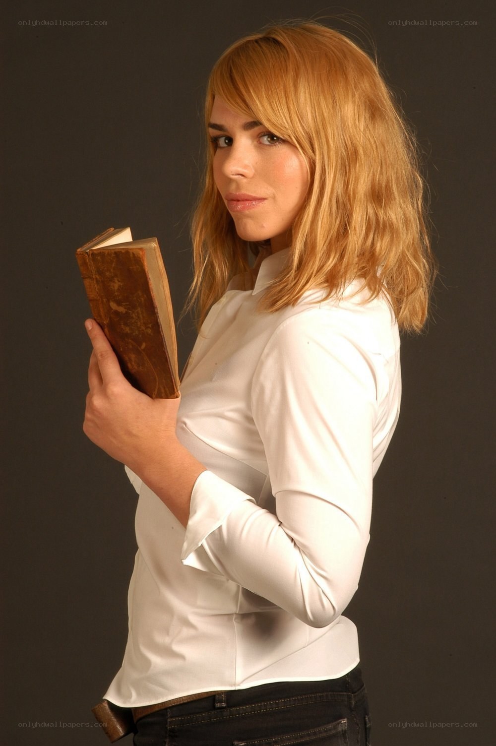woman holding old book