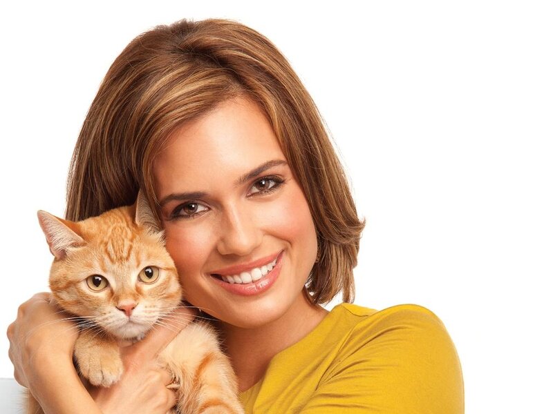 Woman Holding Orange Cat