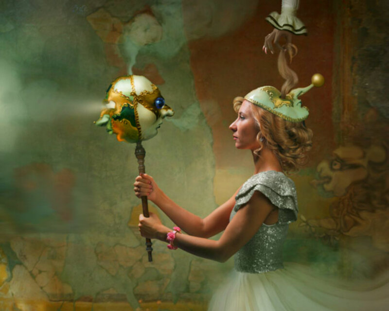 Woman Holding Ornate Staff — Green