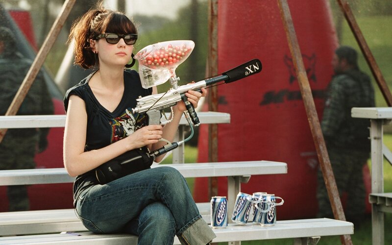 Woman Holding Paintball Gun — Black