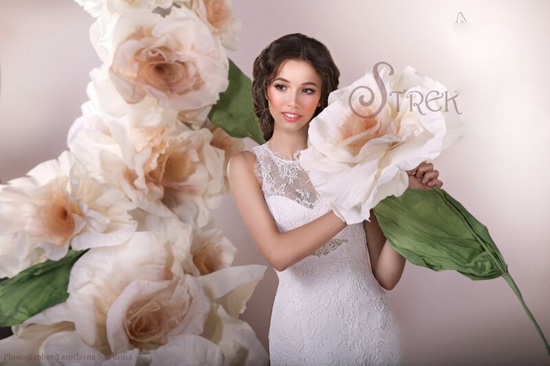 Woman Holding Paper Flowers