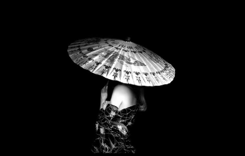 Woman Holding Parasol — Black, Dramatic