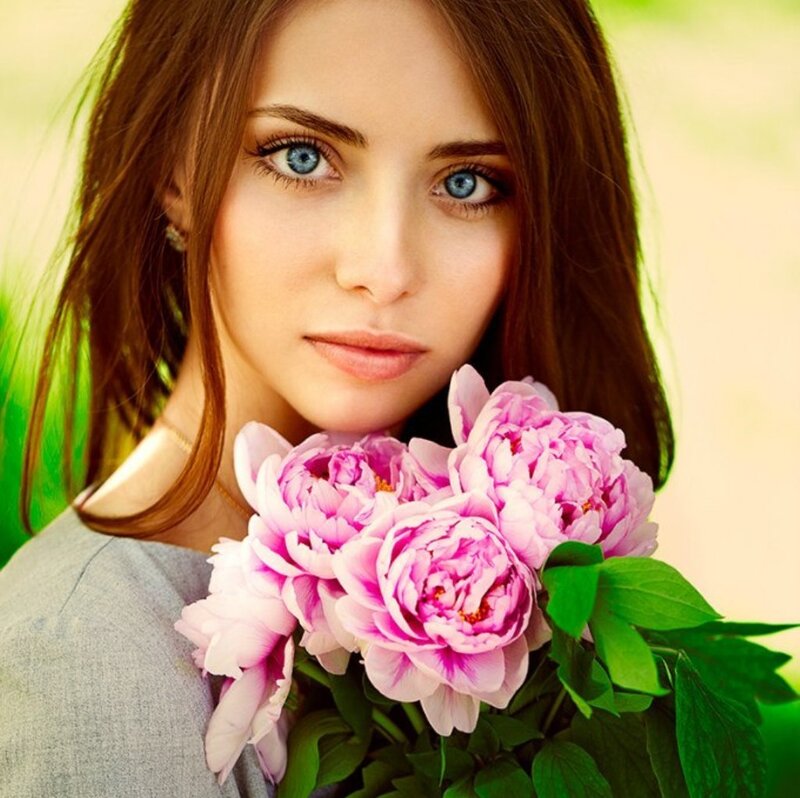 Woman Holding Peonies — Pink