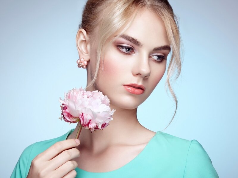 Woman Holding Peony Flower