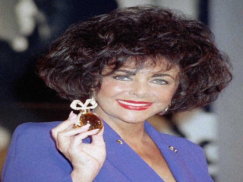 Woman Holding Perfume Bottle — Purple, Confident