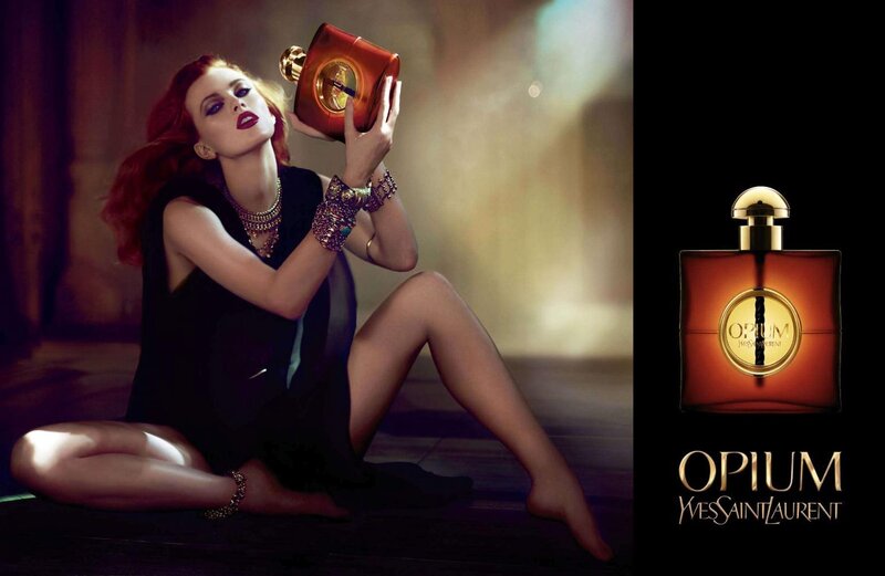 Woman Holding Perfume Bottle — Red
