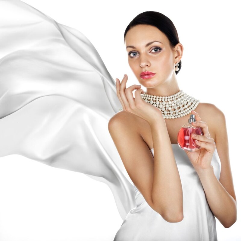 Woman Holding Perfume Bottle — White, Elegant
