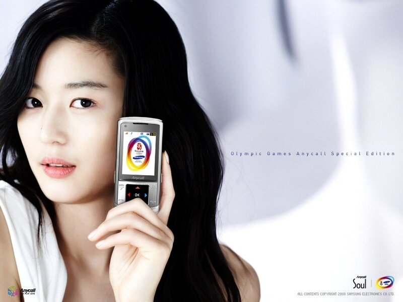 woman holding phone ad