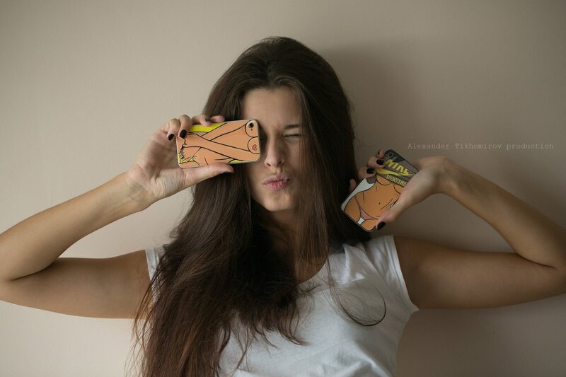 woman holding phone cases