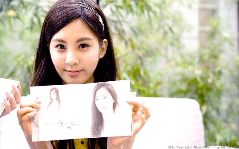 Woman Holding Photo