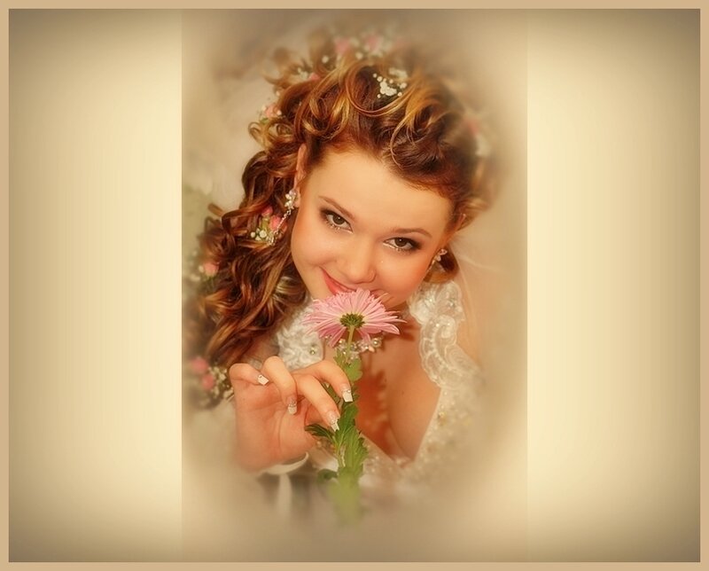 woman holding pink flower