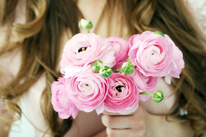 Woman Holding Pink Flowers — Serene