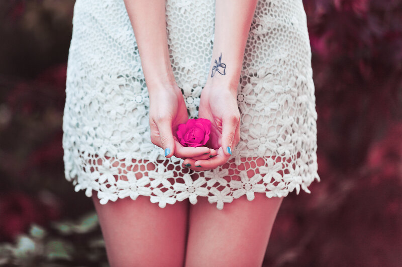 Woman Holding Pink Rose — White
