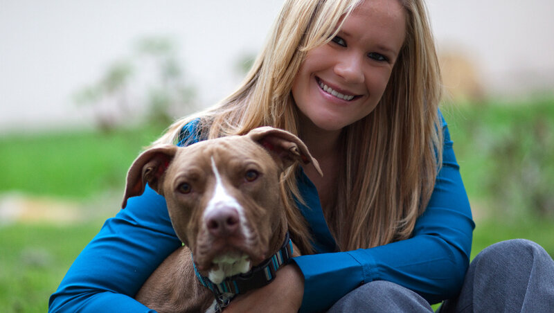 Woman Holding Pit Bull