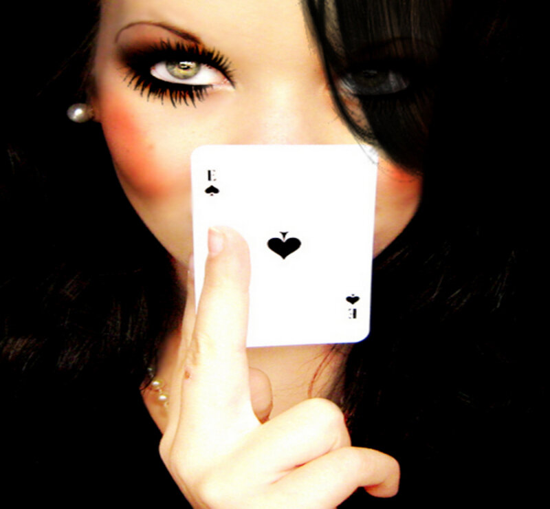 Woman Holding Playing Card — Black