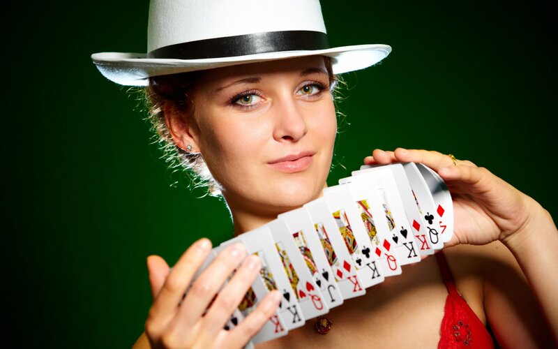 Woman Holding Playing Cards — Green