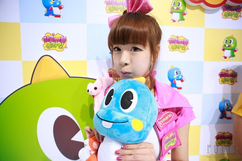 woman holding plush toy