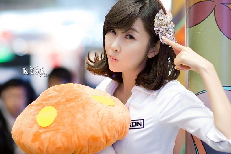 woman holding plush toy