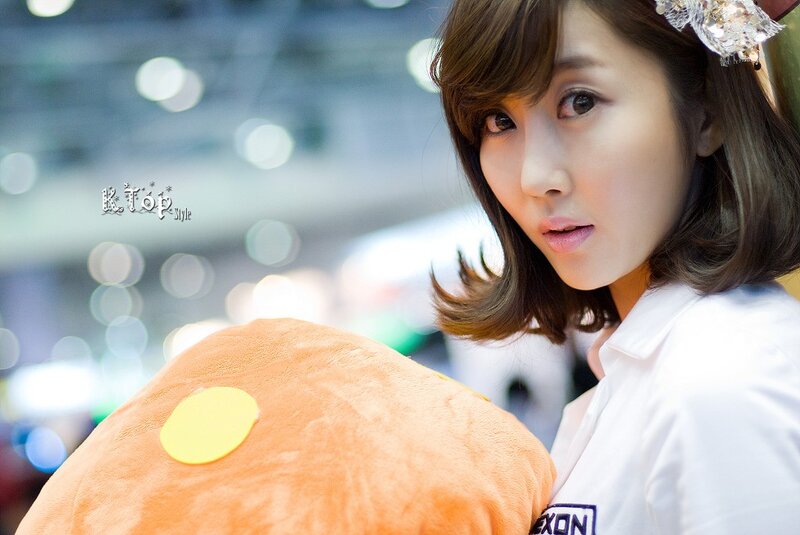 woman holding plush toy