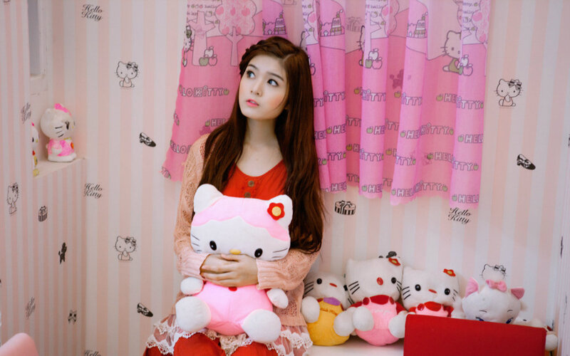 Woman Holding Plush Toy — Pink