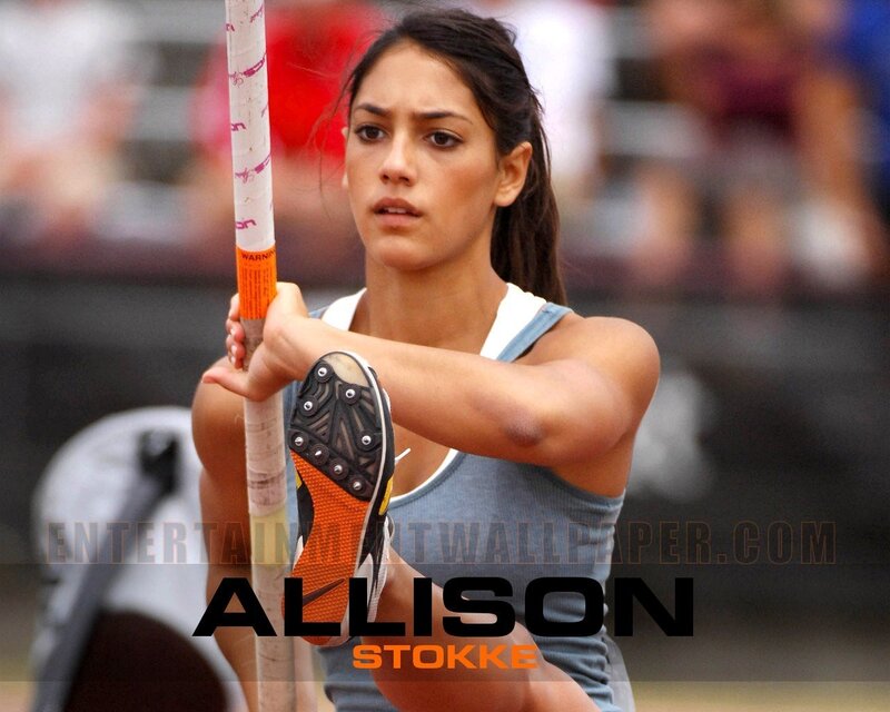 Woman Holding Pole — Blue, Focused