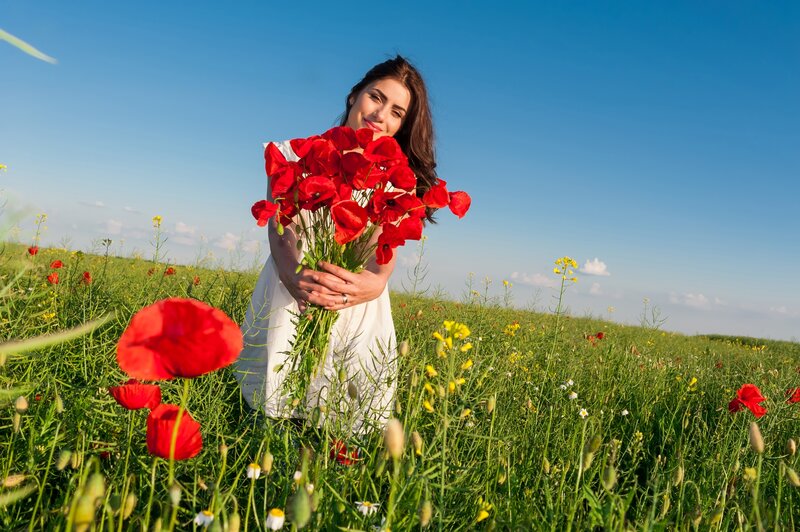 Woman Holding Poppies