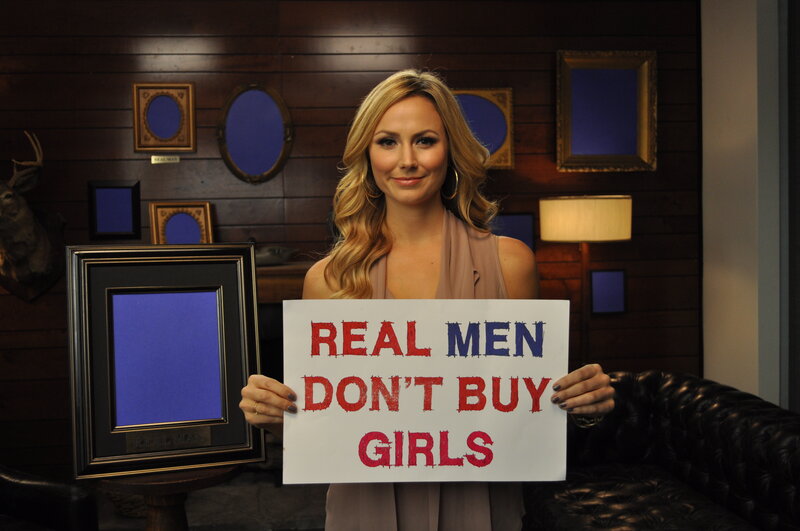 woman holding protest sign