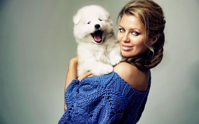 Woman Holding Puppy — Blue, Calm