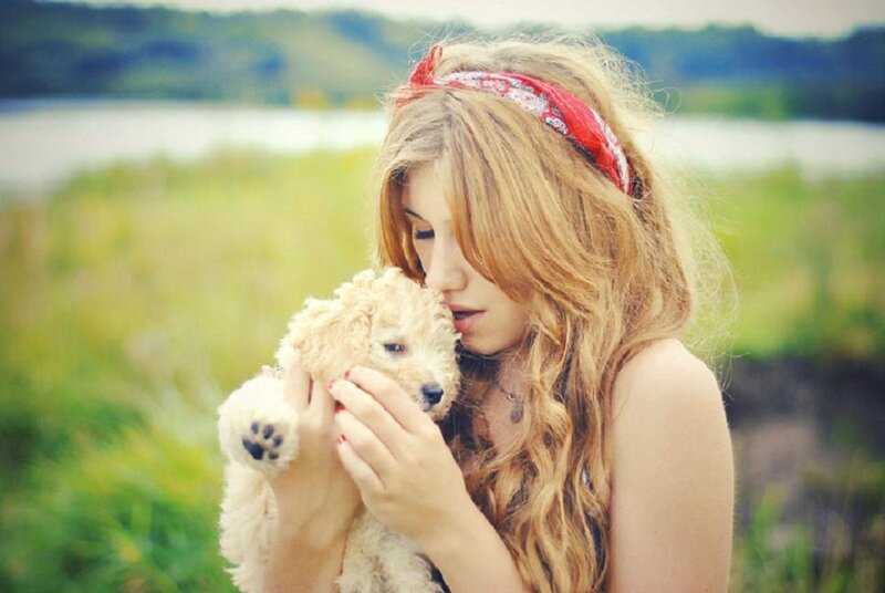 Woman Holding Puppy — Green
