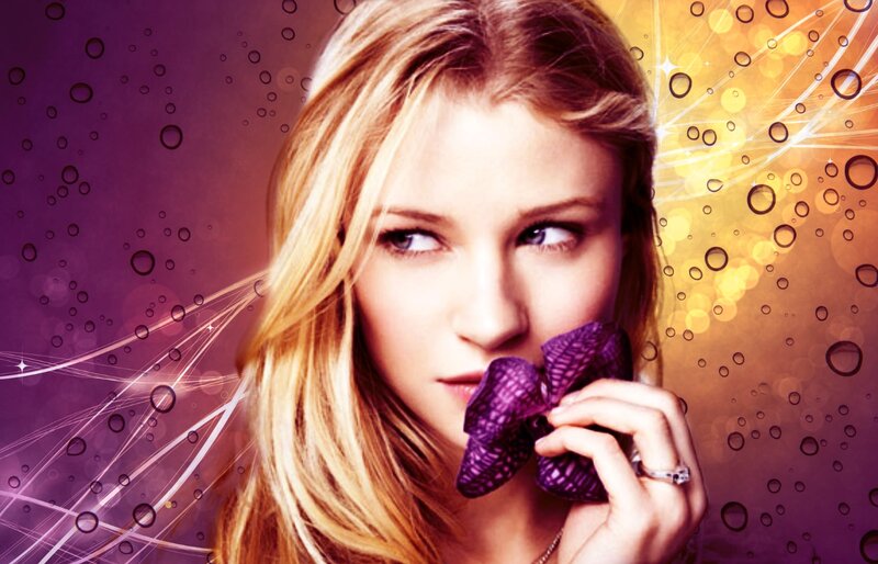 Woman Holding Purple Bow