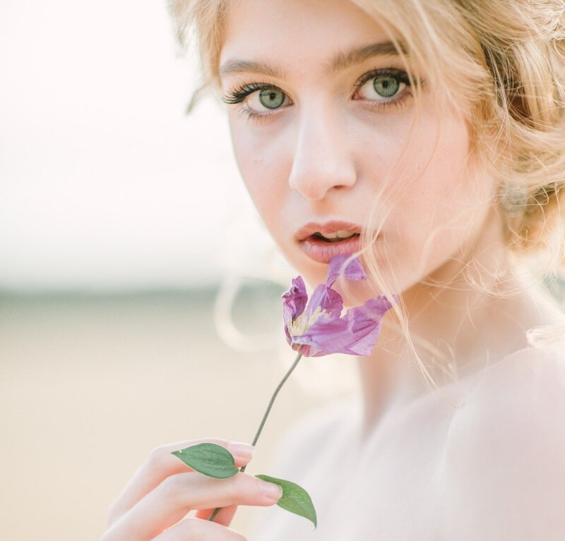 Woman Holding Purple Flower — Serene, Afternoon