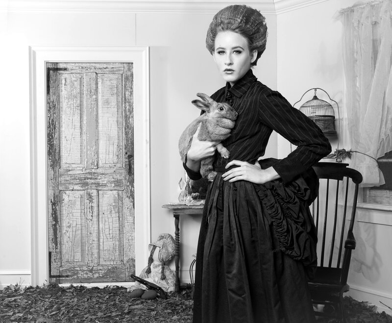 Woman Holding Rabbit — Black, Dramatic