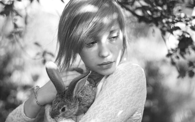 Woman Holding Rabbit — Black