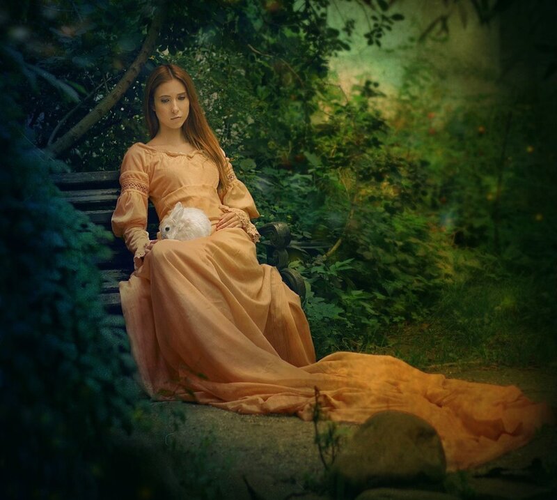 Woman Holding Rabbit — Orange