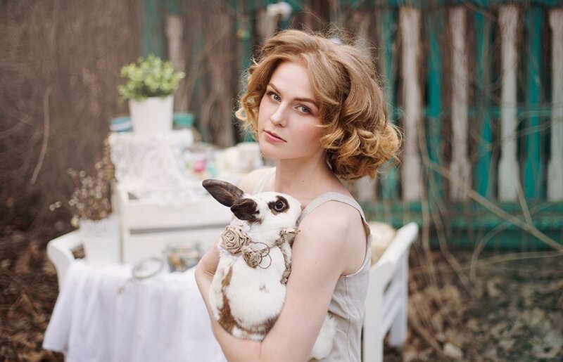 Woman Holding Rabbit — White, Serene, Spring